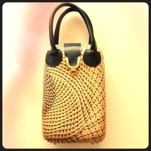 Elegant wicker and leather purse handbag